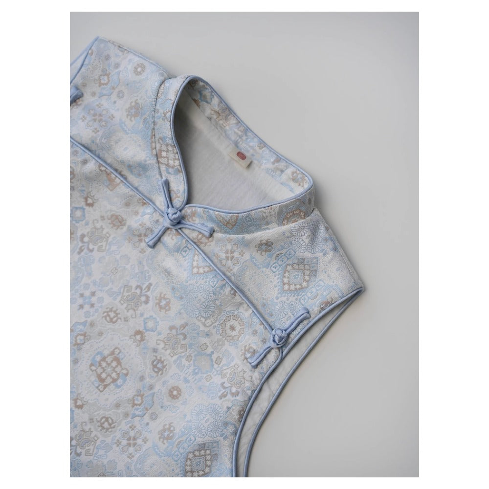 Gilet unisexe MaNa en jacquard bleu clair avec bordure en soie