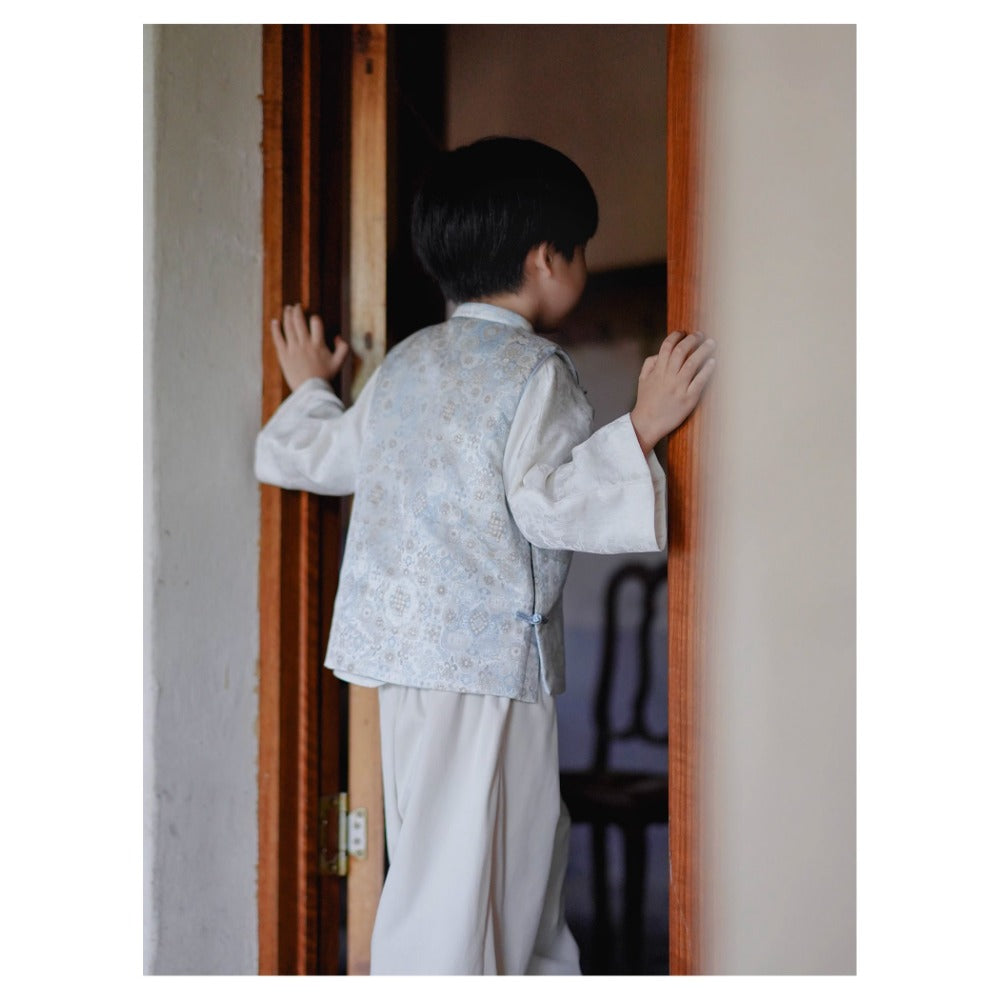 Gilet unisexe MaNa en jacquard bleu clair avec bordure en soie