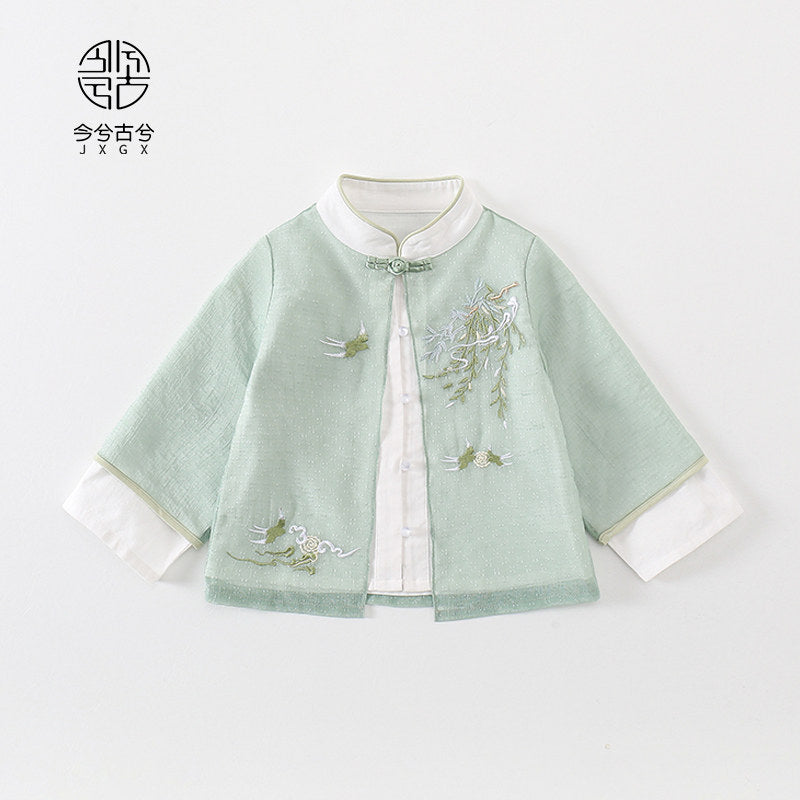 Light green traditional jacket with white inner lining and floral embroidery on a white background