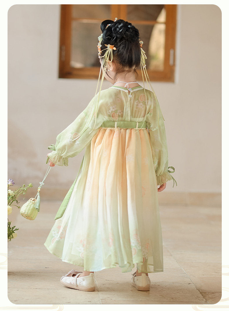 Child wearing a traditional outfit with a blurred background