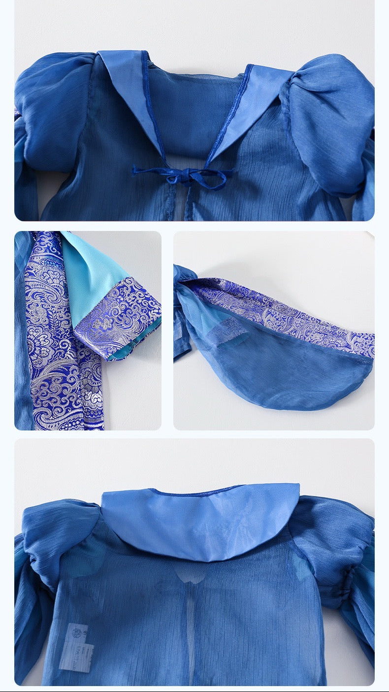 Blue garment with a bow detail on a white background