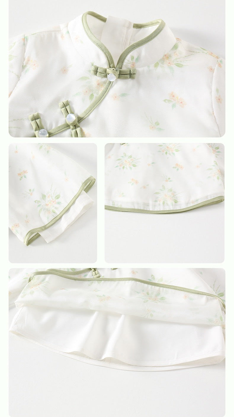 White Girls outfit with green floral patterns on a white background