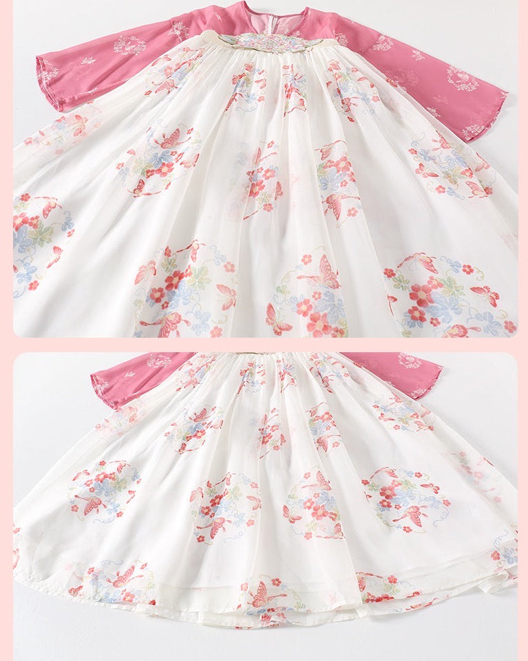Floral dress with pink sleeves on a light pink background