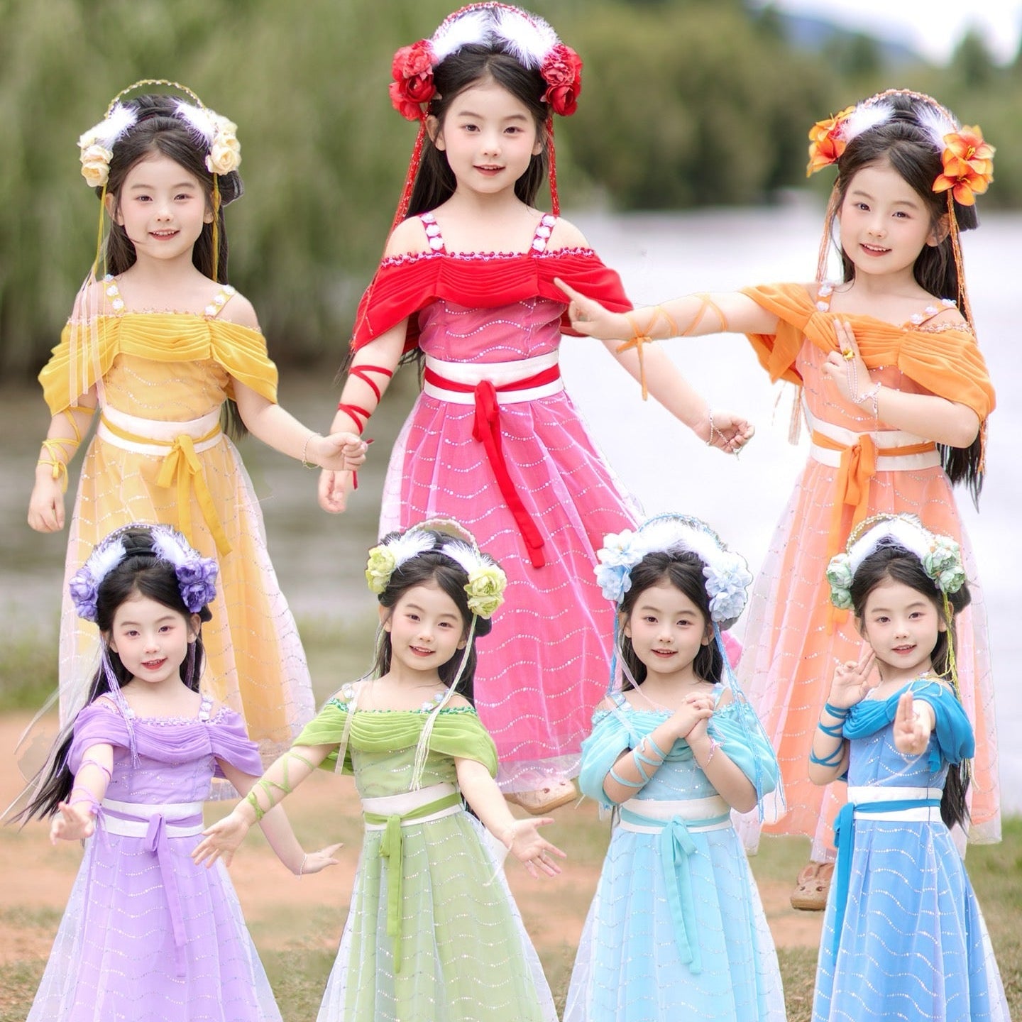 Group of children in colorful dresses standing outdoors with a natural background.