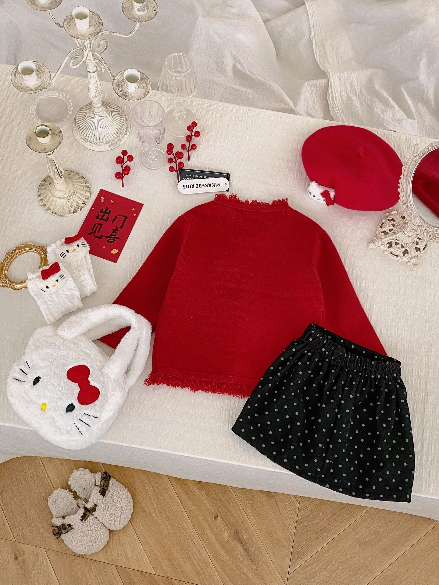 Hello Kitty Cozy Fringe Hooded Sweater in Red