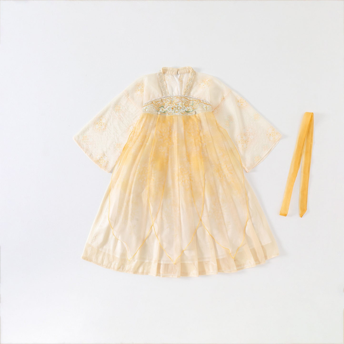 Yellow dress with a belt on a white background